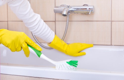 Bathroom deep cleaning with polished fixtures and tiled surfaces